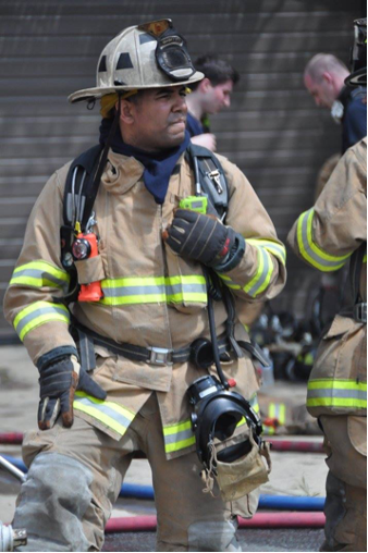 Chief Christopher Jones pictured in turnout gear at a training exercise.